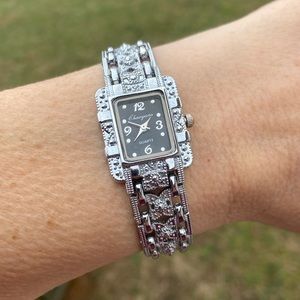 Chaoyada quartz watch faux marcasite link band black face